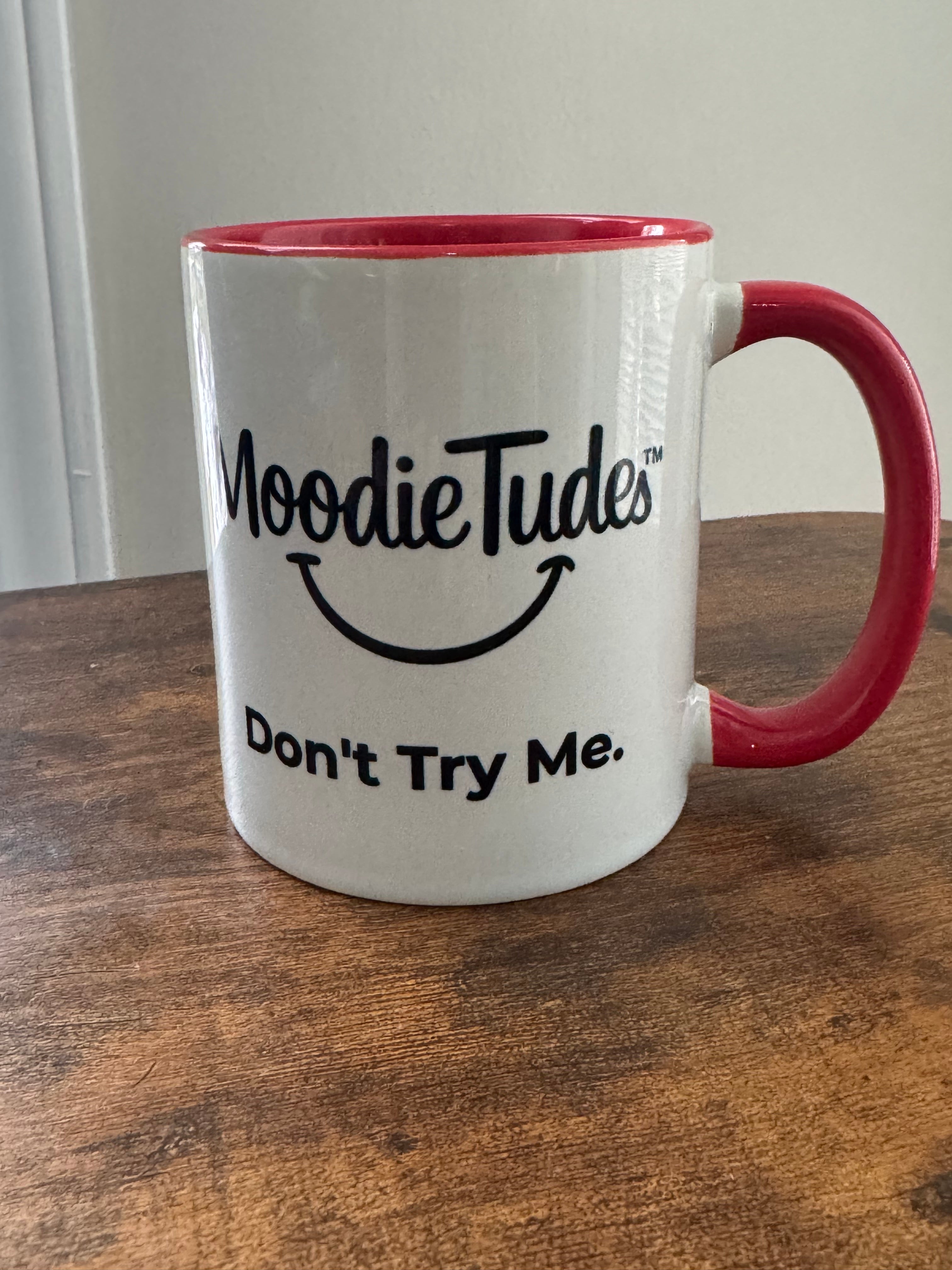 MoodieTudes™ Don't Try Me mug , lifestyle with logo and tag line visible