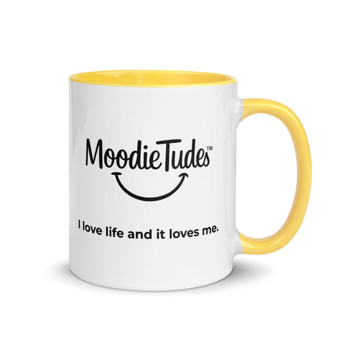 MoodieTudes™ Radiant mug with yellow handle and interior, logo and tag visible
